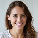 Professional headshot of a female nutritionist, smiling warmly